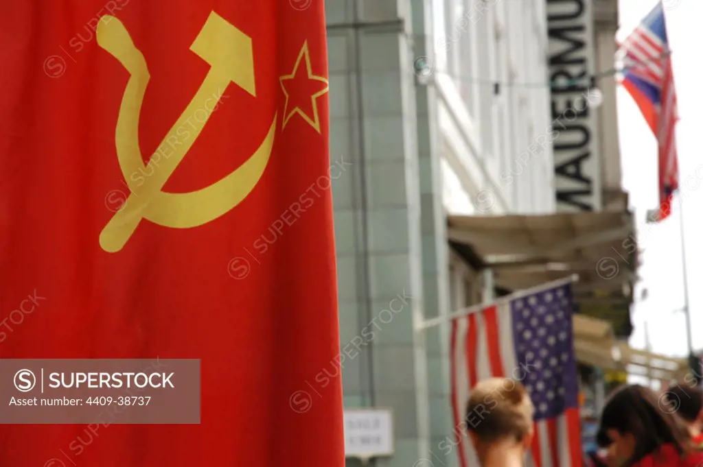 Flag of the former USSR in Checkpoint Charlie, the most famous of the crossing points of the Berlin Wall between the two parts of the city. Berlin. Germany.