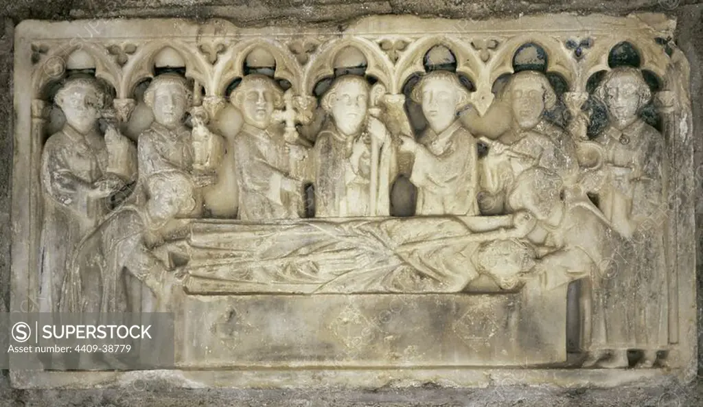 Martin-du-Canigou. Monastery built in 1009 in the Pyrenees. Tombstone. Reliefs represent: The funeral procession of the abbot Arnau de Corbiat (14th century). Pillar of the cloister of the Monastery. Gothic style. France.