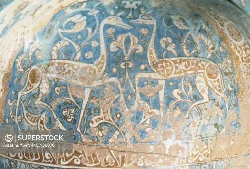 Vase of the Gazelles. Glazed pottery. Nasrid Period (1301-1400).14th century. Detail depicting two gazelles facing. Alhambra Museum. Granada. Spain.