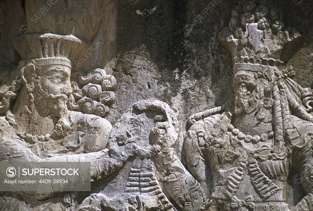 Sassanian rock relief. The Investiture of Narseh receiving the ring of kingship from a female figure (divinity Aredvi Sura or Queen Shapurdokhtak), c. 293-303. Naqsh-e Rustam, Fars Province, Iran. (Ancient Persia).