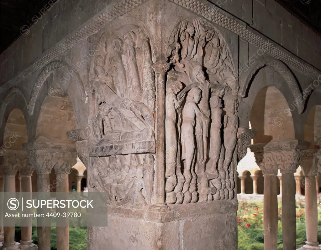 Cloister of Santo Domingo de Silos. Began in the late XI century and completed in the XII. Detail of a corner decorated with two bas-reliefs. Santo Domingo de Silos. Province of Burgos. Castile and Leon. Spain.