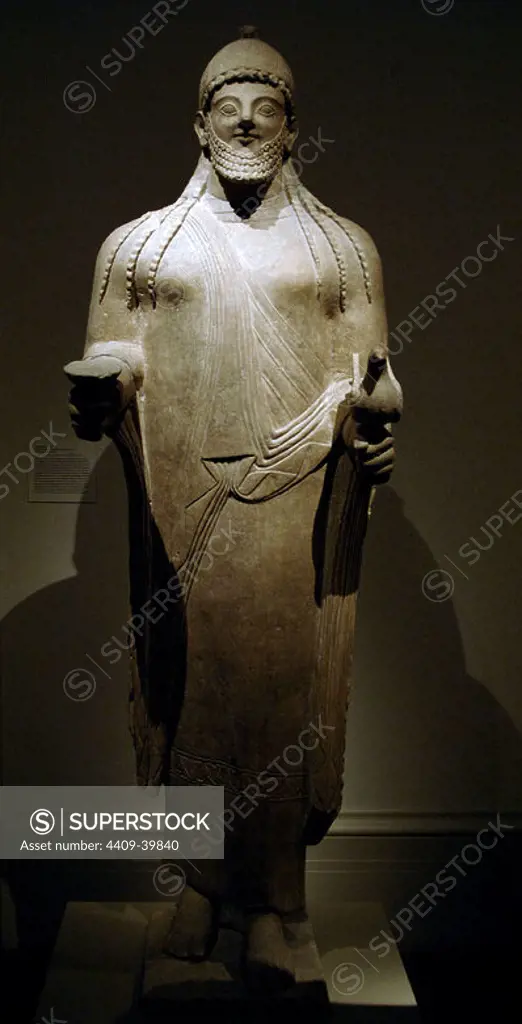 Phoenician art. Cyprus. Statue of a priest. Late sixth century BC. Archaic Period. Limestone. It comes from Golgoi (Cyprus). Metropolitan Museum of Art. New York. United States.