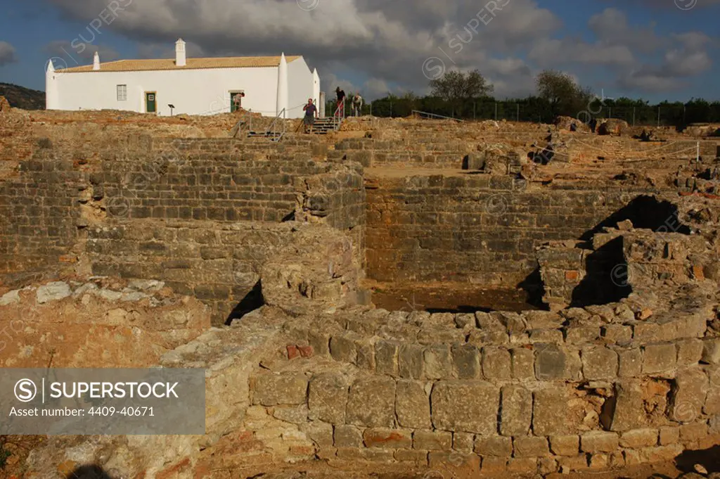 Ruins of Milreu. Roman Villa (1st - 4th century A.D.). In the foreground, the Baths. Behind, a sixteenth century house. Estoi, near Faro. Algarve. Portugal.