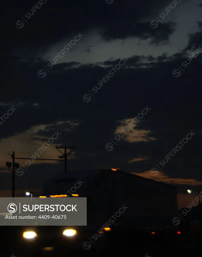 Truck circulating at night on Highway 10 between San Antonio and El Paso. State of Texas. United States.