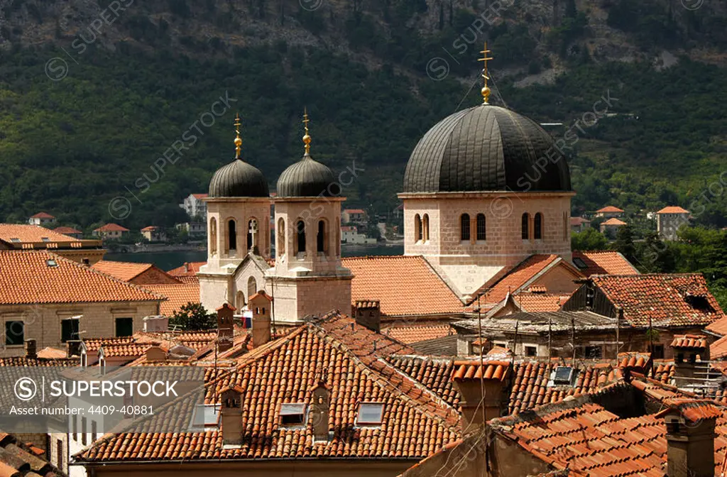 REPUBLIC OF MONTENEGRO. KOTOR. Partial view of the city with the church of St. Nicholas. In 1979 UNESCO declared World Heritage the whole Natural, Cultural and Historical region of Kotor.