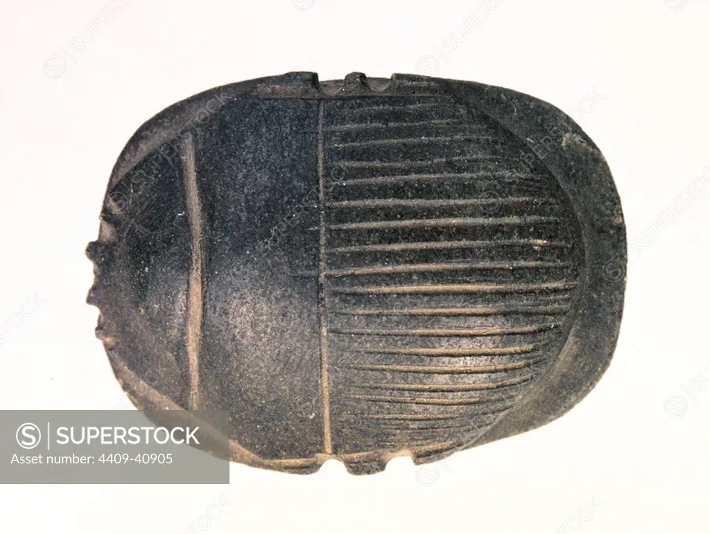 Egyptian art. Beetle-shaped amulet symbol of Khepri, god of sunrise.