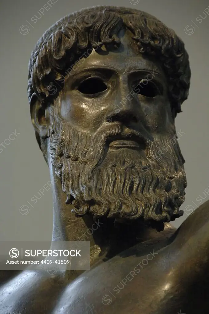 Greek art. Classical period. Initial Period. Zeus. Bronze sculpture. Dated to the year 460 BCE Found at sea from Cape Artemision. Severe Style. Detail of the head. National Archaeological Museum. Athens. Greece.