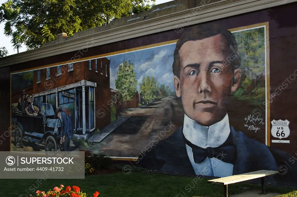 History of the United States, 20th century. Mural depicting the local banker A. J. Barnett, who owned Cuba's first Ford Model T. By Michelle Loughery (b. 1961). Series of murals depicting historical scenes of both local and national themes. Cuba, State of Missouri, United States. Author: Michelle Loughery (b.1961). Canadian muralist.