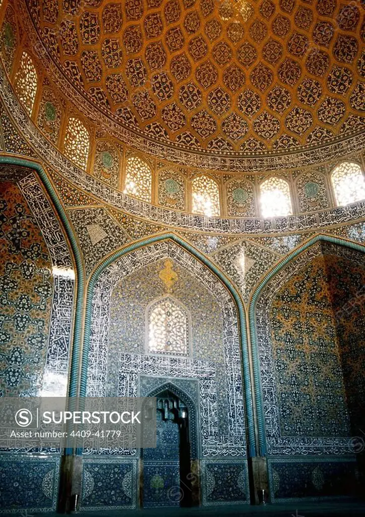 Islamic Art. Safavid era. Sheikh Lotf Allah Mosque. Built in 1598 during the reign of Abbas I and completed in 1602 in time of Sheikh Lotfollah. Mirhab and dome of the prayer hall covered with glazed tiles and writing of Ali Reza Abbasi. Isfahan. Islamic Republic of Iran.