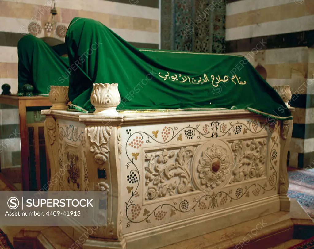 Saladin (real name Salah_ al-Din Yusuf ibn Ayyub) (1138-1193). The first Sultan of Egypt and Syria and the founder of the Ayyubid dynasty. Mausoleum of Saladin. Two Cenotaphs. First, marble coffin (empty) gift from Emperor Wilhem II next to a wooden tomb that holds Saladin's body. Damascus. Syria.
