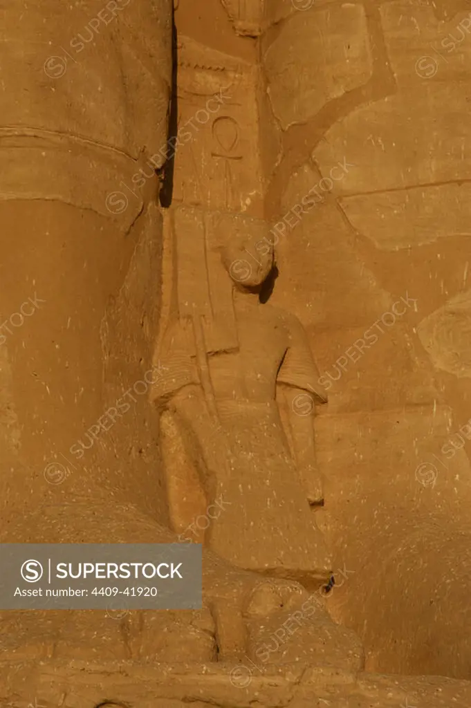 Egyptian Art. Temple of Ramses II (1290-1224 BC). Young prince. Statue near the feet of the colossi of Ramses II. 19th dynasty. New Kingdom. Abu Simbel. Egypt.