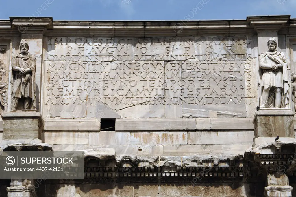 Roman Art. Arch of Constantine. Triumphal arch erected in the 4th century (315) by the Senate in honor of the Emperor Constantine after his victory over Maxentius at the Battle of Milvian Bridge (312). Latin inscription. Rome. Italy.