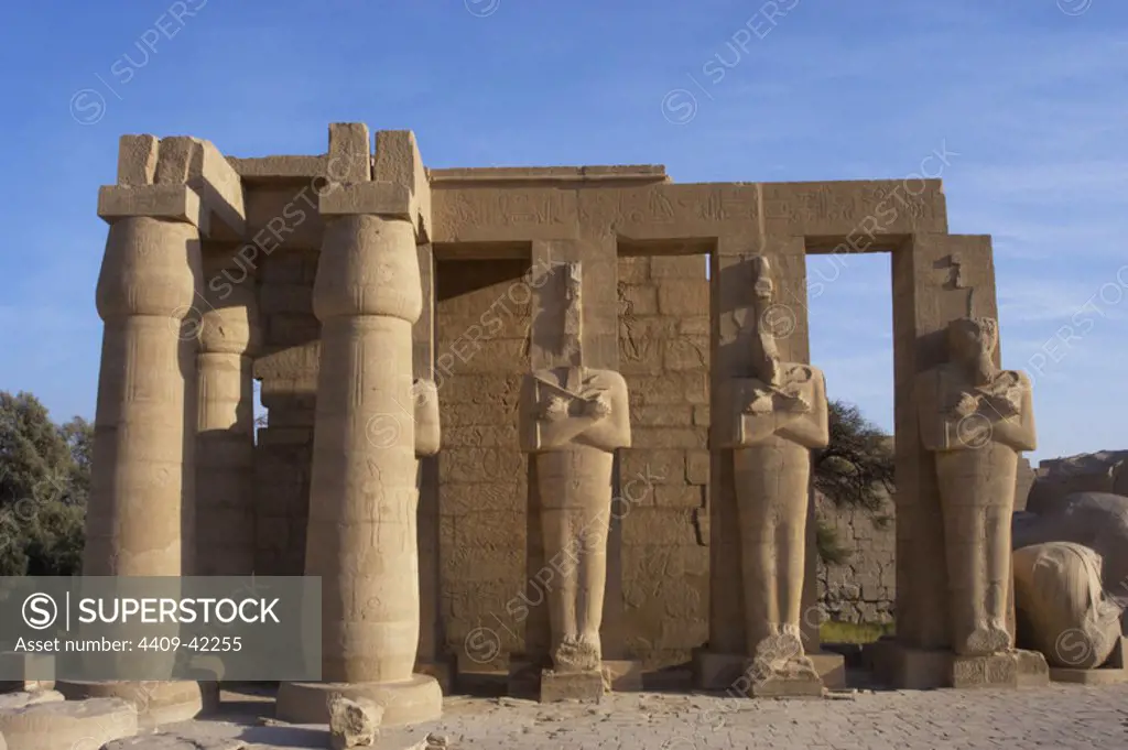 Rameseum. Pillars with osirian statues. 13th century B.C. Nineteenth Dynasty. New Kingdom. Necropolis of Thebes. Valley of the Kings. Egypt.