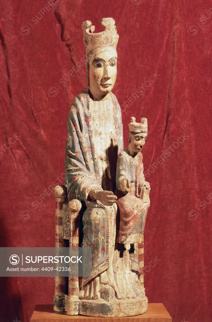 Romanesque. Virgin with Holy Child. Polychrome carving from the 12th century. Uncertain origin, from Catalonia. National Art Museum of Catalonia, Barcelona, Catalona, Spain.