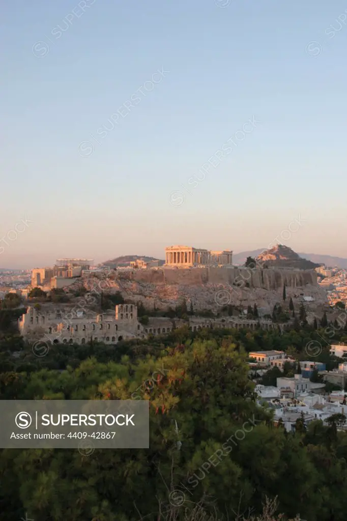 Athens. Panoramic view of the Acropolis from Philapoppos Hill. Sunset. Attica. Central Greece.