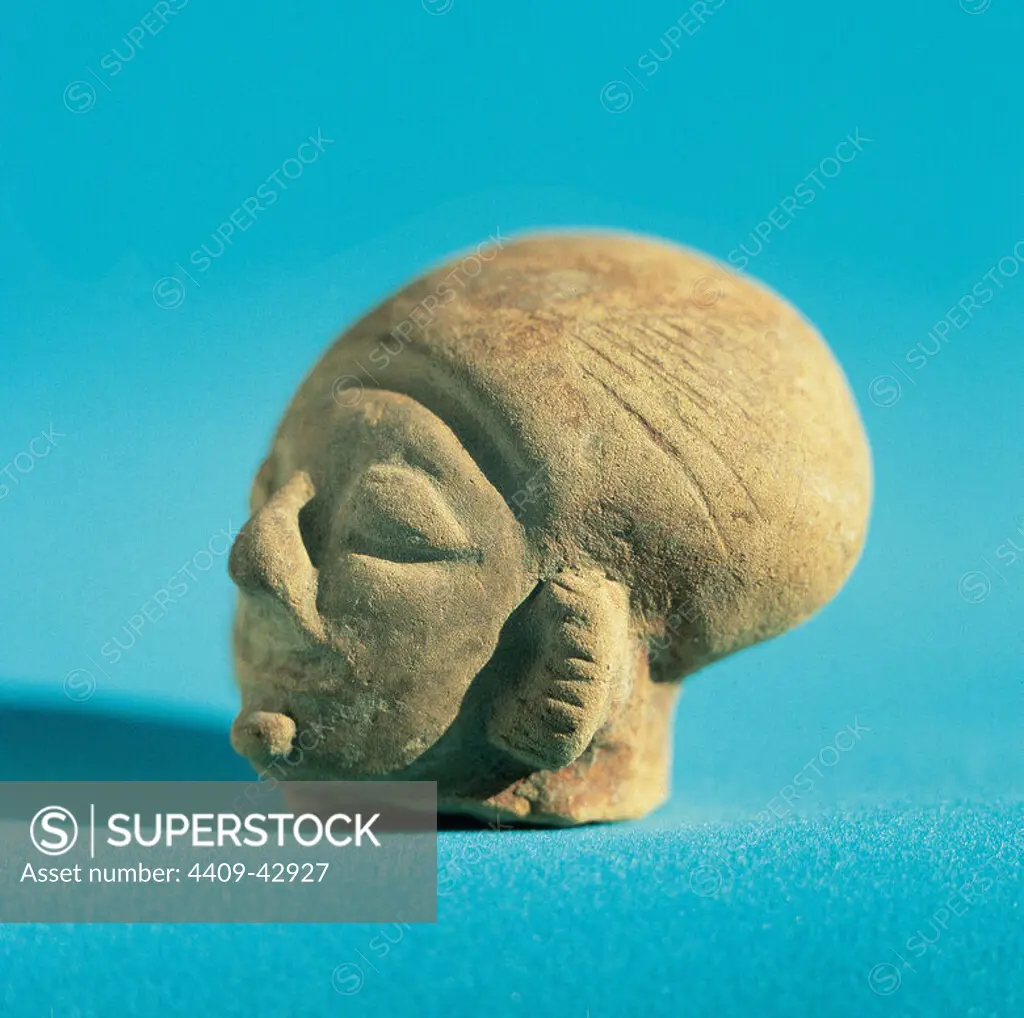 Pre-Columbian Art. Ecuador. Pre-Inca Period. Period of Regional Development. Jama-Coaque Culture. Coast of Ecuador (500BC-500AD). ceramic head. 300-200 BC-700-800 AD. Ecuador.