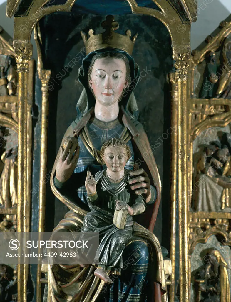 Gothic art. MADONNA AND CHILD. It comes from the Monastery of San Andres del Arroyo (Palencia). It dates from the XIII-XIV centuries. Carved in wood. Mares Museum. Barcelona. Catalonia.