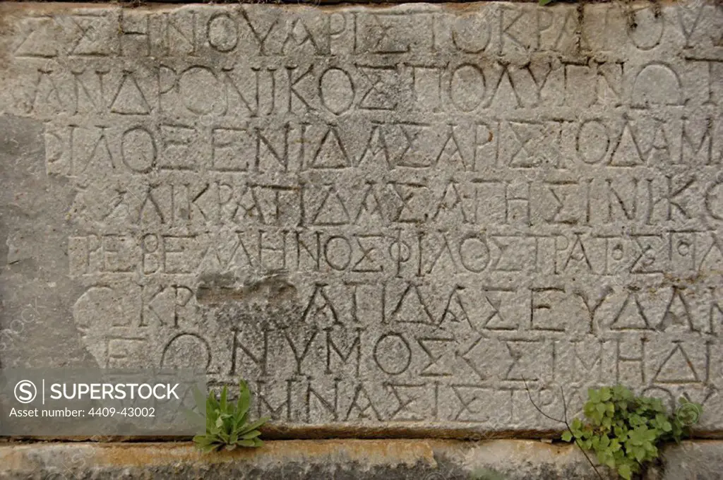 Greece. Sparta. Inscription on the stone. Greek writing. Old Theater. Peloponnese.