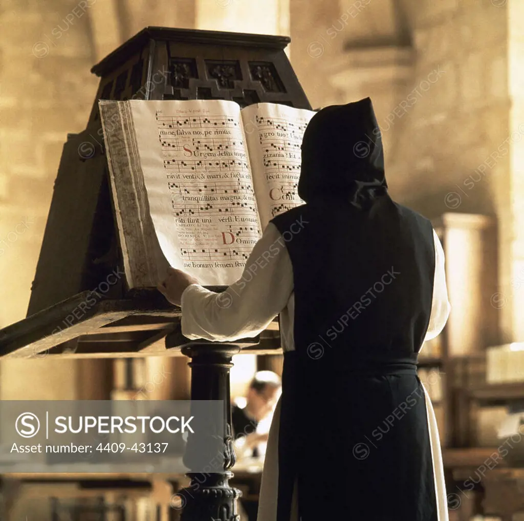 Benedictine monk reading a choir book. Monastery of Poblet. Vimbodi´. Catalonia. Spain.