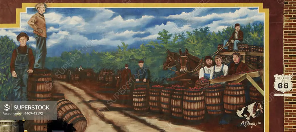 History of the United States. 20th Century. Wall painting depicting apples in barrels ready to be transported by train. By Shelly Smith Steiger. Series of murals depicting historical scenes of both local and national themes. Cuba, State of Missouri, United States.