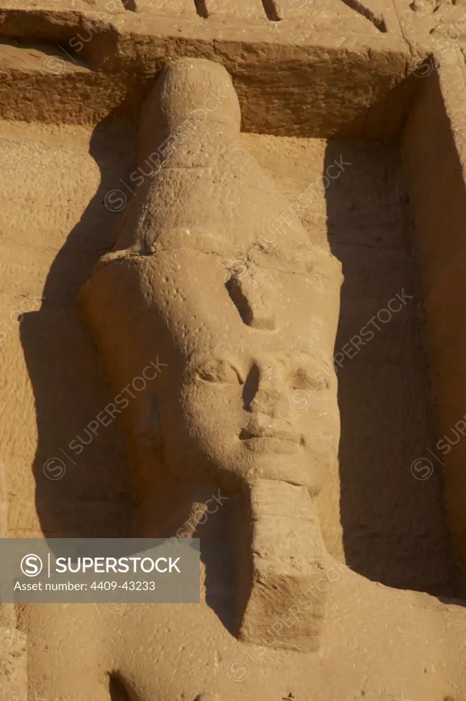 Egyptian art. Temple of Hathor or Small Temple dedicated to Nefertari. Facade depicting the pharaoh Ramses II (1290-1224 BC) with double crown and false beard. 19th dynasty. New Kingdom. Abu Simbel. Egypt.
