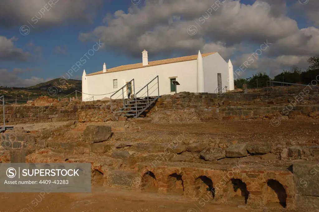 Ruins of Milreu. Roman Villa (1st - 4th century A.D.). In the foreground, the Baths. Behind, a sixteenth century house. Estoi, near Faro. Algarve. Portugal.