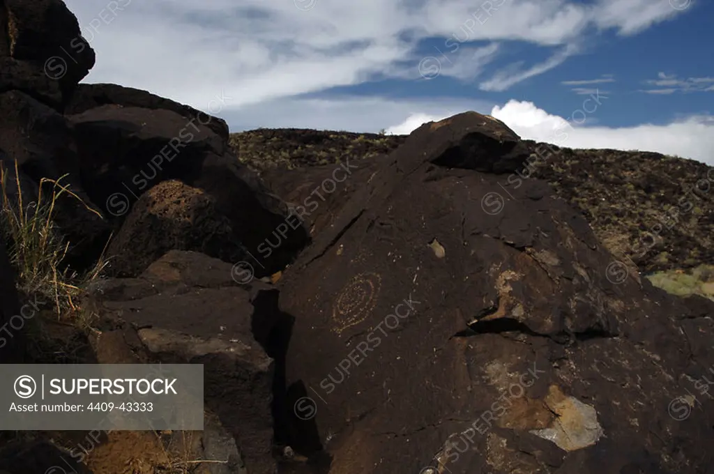Prehistoric Art. USA. Petroglyph National Monument. Petroglyphs made __by American Indian people and some of them, by settlers. Boca Negra Canyon. Near Albuquerque. New Mexico.