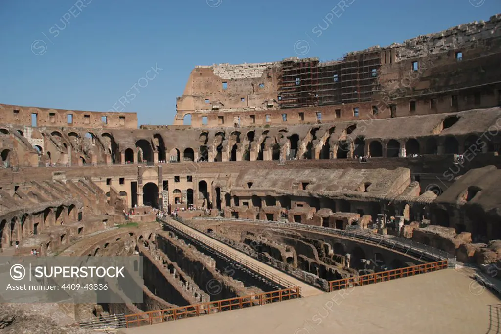 Roman Art. The Colosseum (Coliseum) or Flavian Amphitheatre. Its construction started between 70 and 72 AD under emperor Vespasian. Was completed in 80 AD under emperor Titus. View inside building. Rome. Italy. Europe.