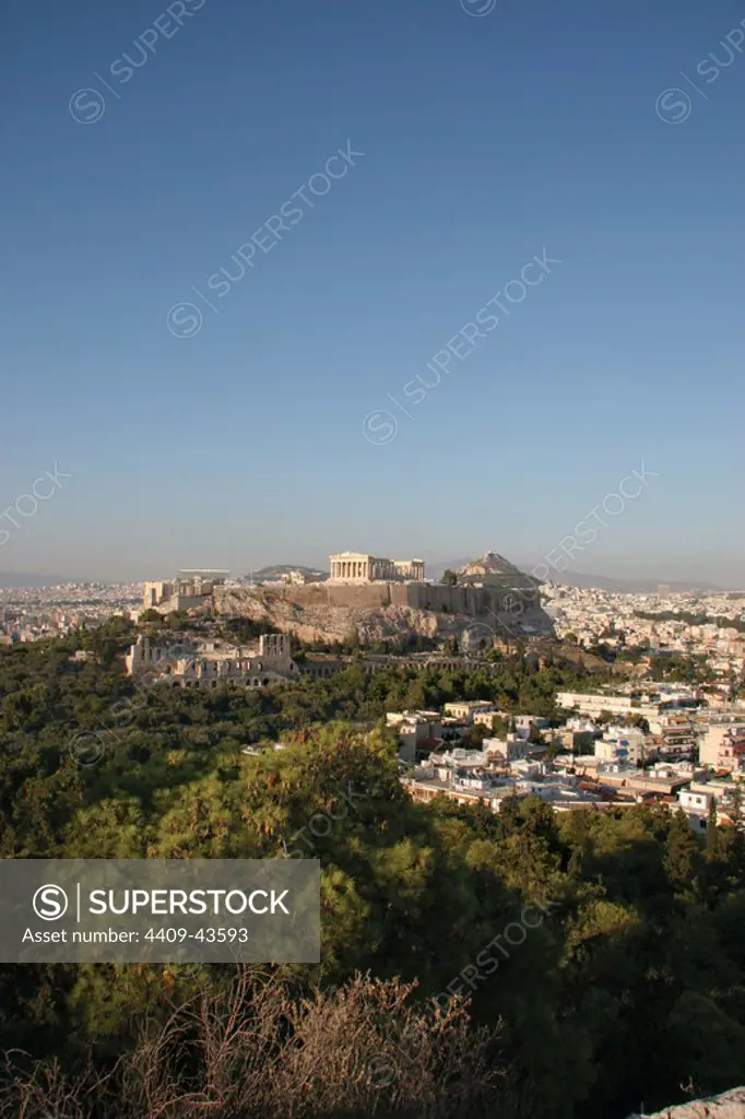 Athens. Panoramic view of the Acropolis from Philapoppos Hill. Sunset. Attica. Central Greece.