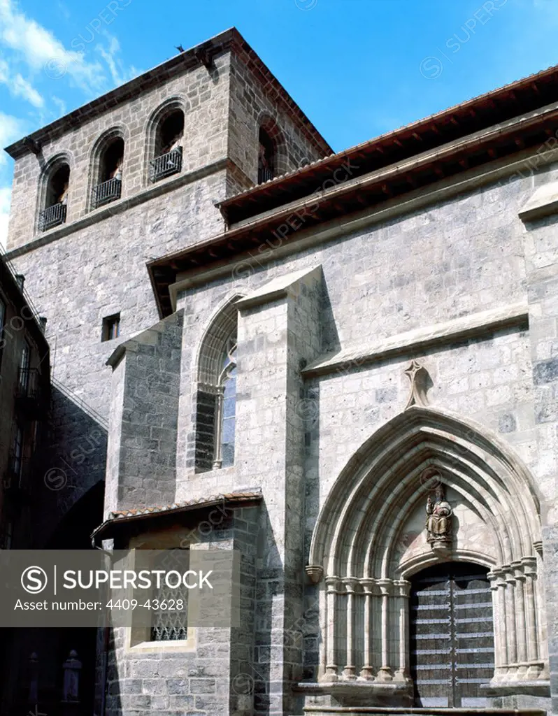 Gothic art. Spain. Church of St. John the Baptist. Exterior of temple with archeries of pointed archs and buttresses on the walls. Mondragon. Province of Guipuzcoa. Basque Country.