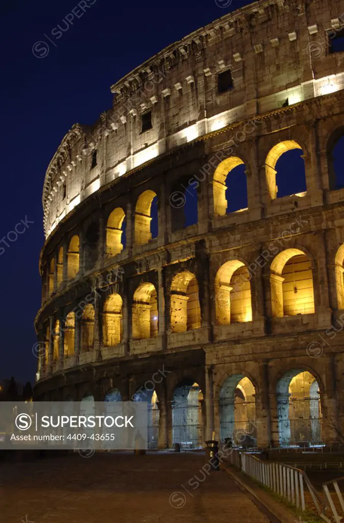 Italy. Rome. The Colosseum (Coliseum) or Flavian Amphitheatre. Elliptical construction built of concrete and stone. 1st century A.C. Nocturnal view.