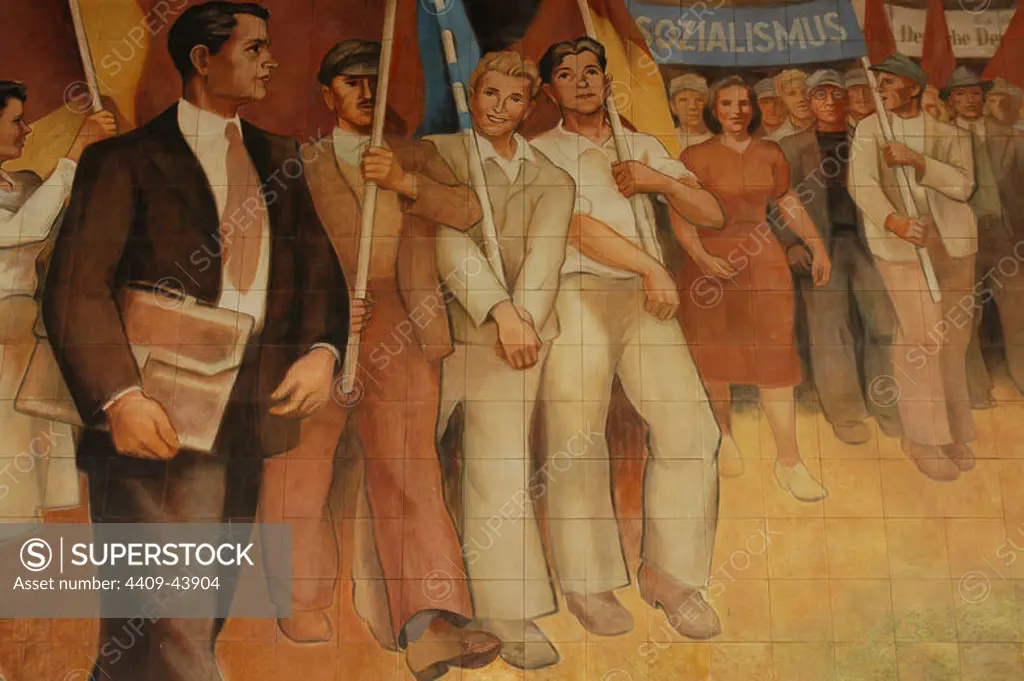 Germany. Berlin. Facade of the Ministry of Aviation, the only Nazi Ministry still standing. Detail of the frescoes with themes of exaltation of communism.
