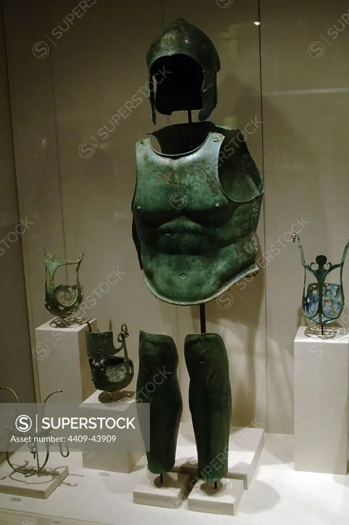 Greek art. Magna Graecia. Bronze helmet, cuirass and shin guard. Muzzle and horse armor. Apulia Region (Southern Italy). Metropolitan Museum of Art. New York. United States.