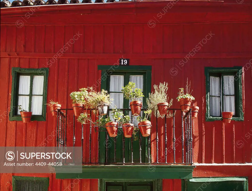 Spain. Basque Country. Balcony with flowerpots.