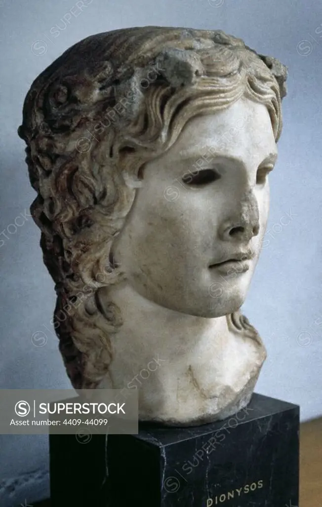 Dionysus (Roman Bacchus). God of the grape harvest and wine. Roman copy (2nd century) after a Greek original bust (2nd century BC). British Museum. London, England.