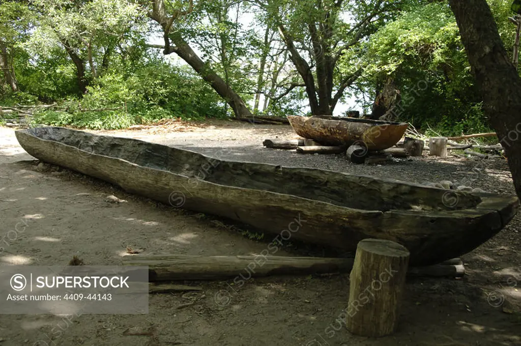 Plimoth Plantation or Historical Museum. Is a living museum in that shows the original settlement of the Plymouth Colony established in the 17th century by English colonists. Canoe. Wampanoag Indian tribe. Plymouth. Massachusetts. United States.