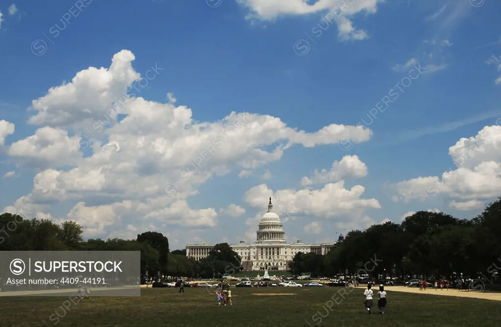 United States. Washington D.C. National Mall. At background, United States Capitol. Built by William Thornton and continued by Charles Bulfinch and Benjamin Henry Latrobe.