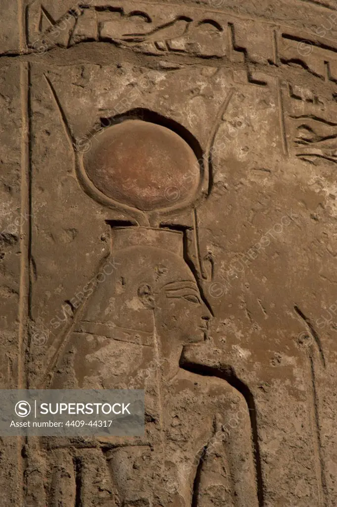 EGYPTIAN ART. EGYPT. (1320-1200). Relief depicting Isis, the goddess who gives life and health. Symbol of fertility. Mother of Horus and wife and sister of Osiris. Represented as a woman with cow horns and the solar disk. FIRST COURTYARD OF RAMSES II. TEMPLE OF LUXOR. Dynasty XIX. New Empire.