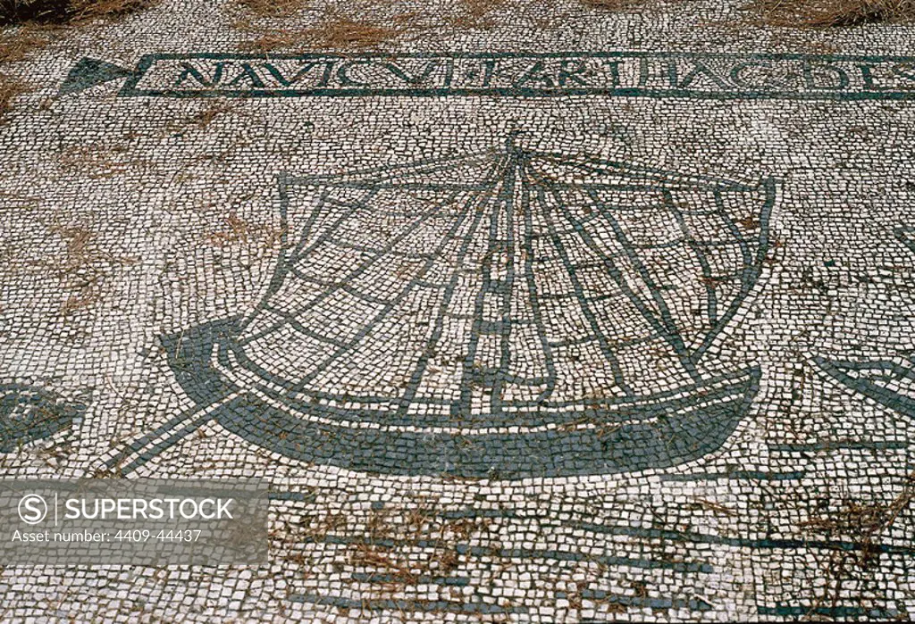 Ostia Antica. Mosaic depicting a cargo ship from Carthage. Square of the Guilds or Corporations.