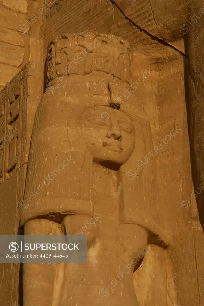 Egyptian Art. Temple of Ramses II (1290-1224 BC). Nefertari. Statue near the feet of the colossi of Ramses II. 19th dynasty. New Kingdom. Abu Simbel. Egypt.
