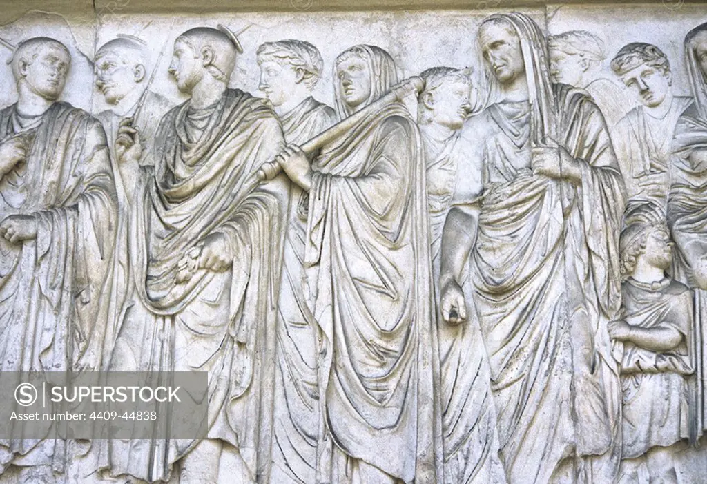 Ara Pacis Augustae. Altar dedicated to Peace, the Roman goddes. Frieze. Procession on south side. Augustus with his cape pulled over his head, Rex sacorum (high priest), four figures (priests), lictor (with an ax). 13-9 B.C. Rome. Italy.