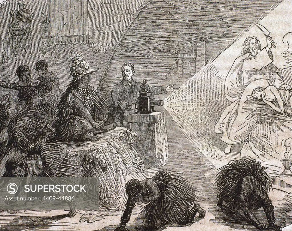 Africa. European settler instructing the natives by a projection with the unit called "Magic Lantern". Engraving from 1879.