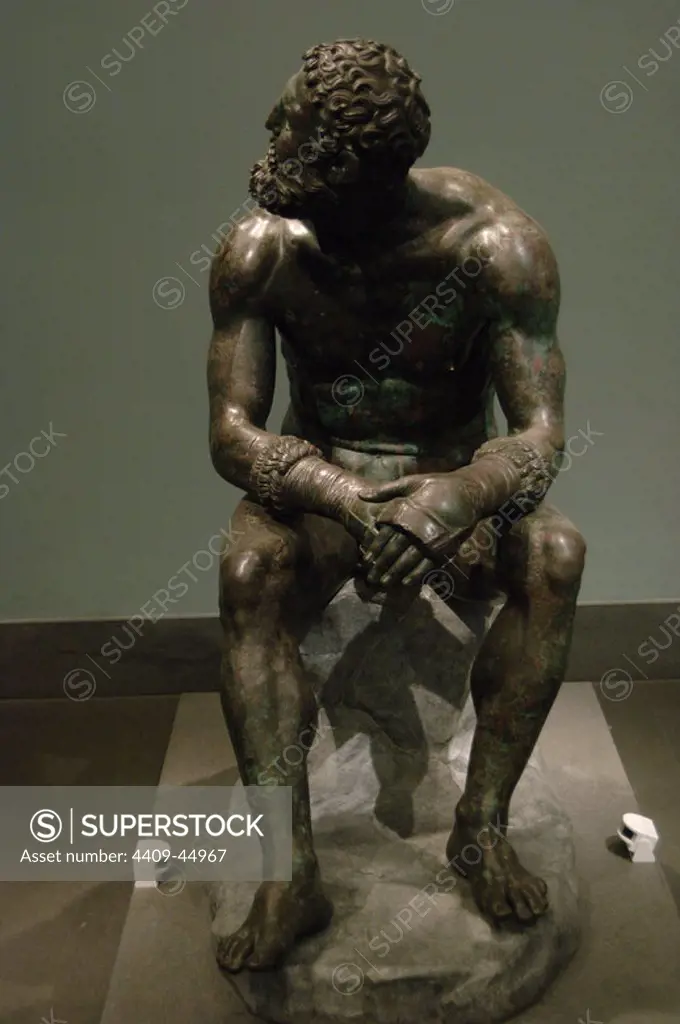 Greek Art. Hellenistic. Boxer of Quirinal or the Terme Boxer. Bronze sculpture of the Hellenistic period (1st century B.C.). Boxer sitting at rest, with metal and leather dressings used for combat. Palazzo Massimo. National Roman Museum. Rome. italy.