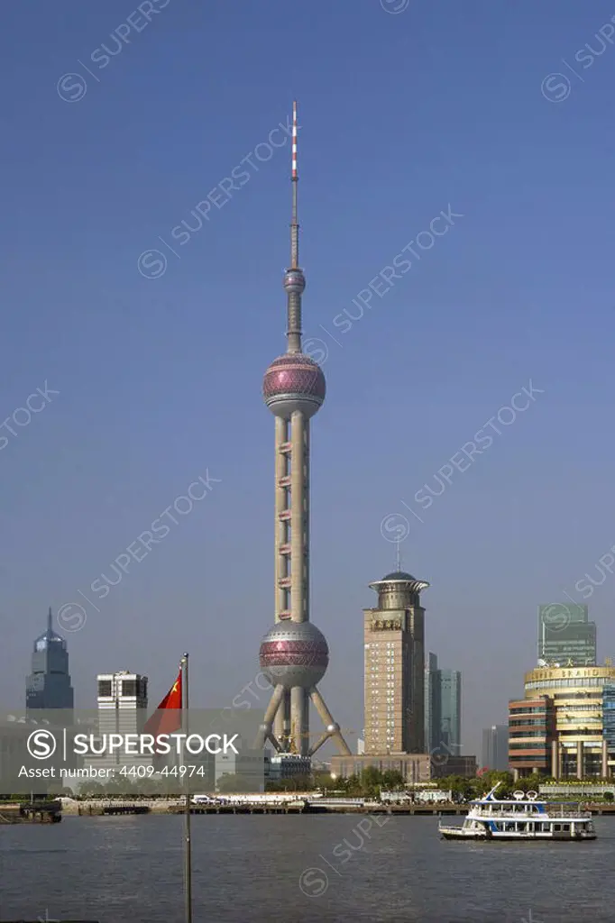 China. Shanghai. Oriental Pearl Tower on the banks of the Huangpu River. Pudong New Area.