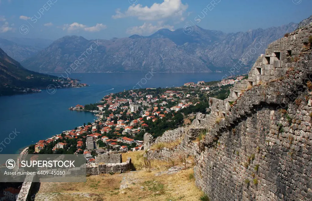 REPUBLIC OF MONTENEGRO. KOTOR. General view of the city along the fjord and the ancient wall. In 1979 UNESCO declared World Heritage the whole Natural, Cultural and Historical region of Kotor.