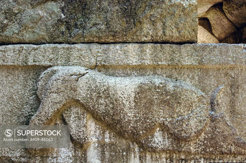 Cyclopean walls of the ancient city dating from IV century B.C. View of the gateway called Lion's Gate, one of the six entrances to the city. It shows a lion devouring a bull. Butrint. Republic of Albania.