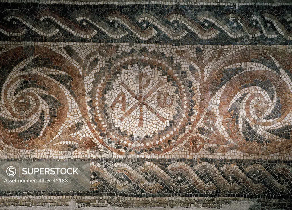 Roman mosaic depicting the Chi-Rho symbol with alpha and omega. Found in Barcelona. Museum of History. Barcelona. Spain.