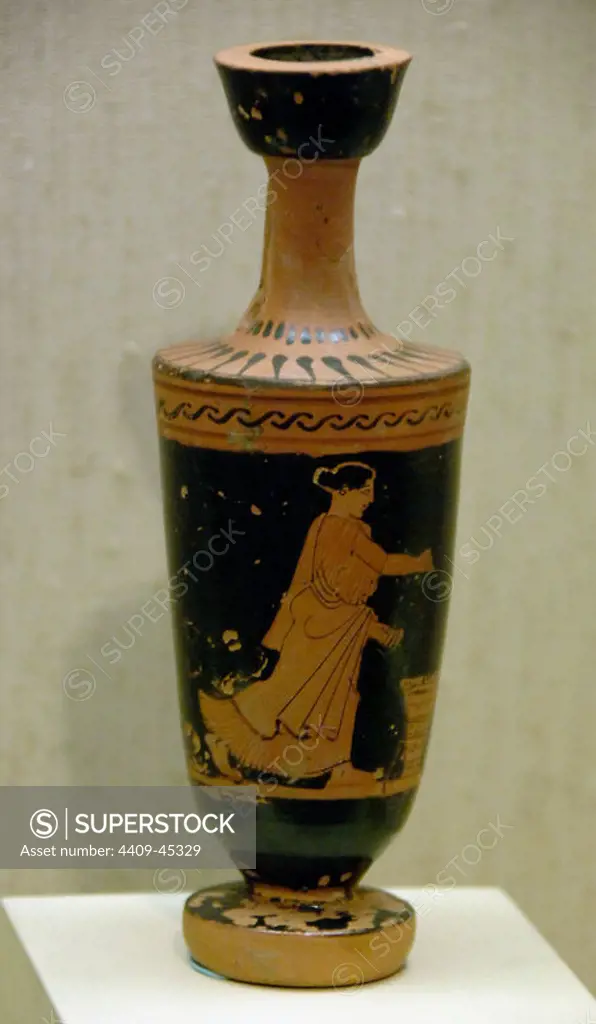 GREEK ART. GREECE. LEKYTHOS red-figure with the image of a woman. Dated between the years 475-450 b.C. Museum of Cycladic and Ancient Greek Art. Athens. Greece.