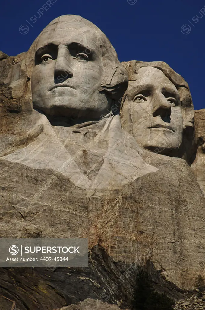 United States. Mount Rushmore National Memorial. Heads of the United States's presidents carved into Mount Rushmore. Detail. From left to right, George Washington and Thomas Jefferson. 1927-1941. By Gutzon and Lincoln Borglum. Keystone.