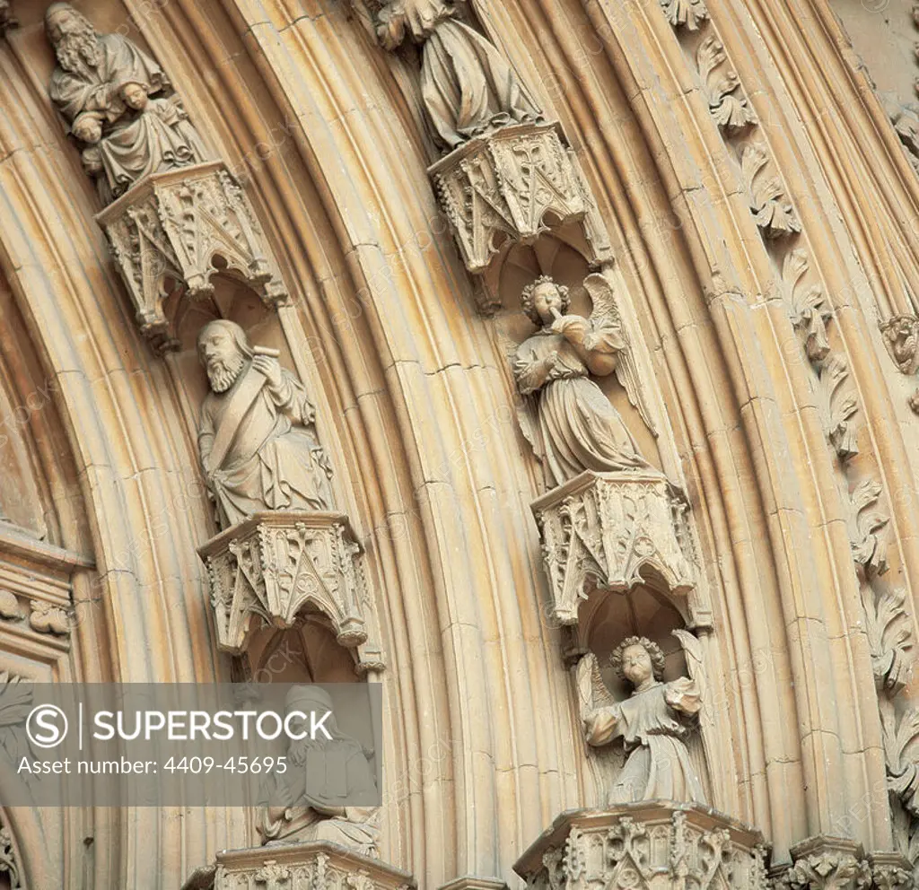 Spain. Palma of Majorca. Cathedral of Saint Mary. Gate of Viewpoint. Archivolts depicting angels musicians. Gothic style. Detail. 14th century. Balearic Islands.